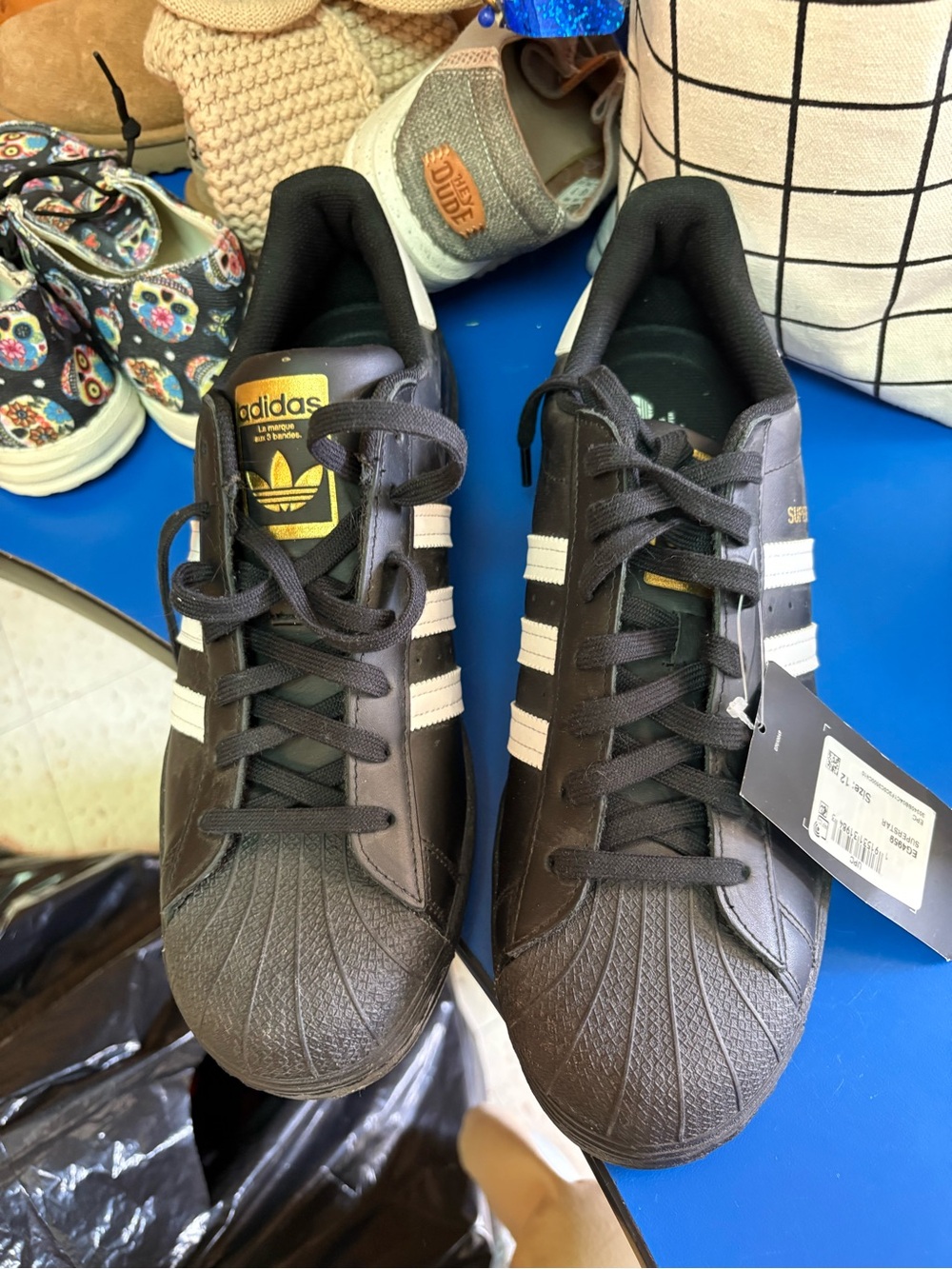 adidas Men’s Black & White Superstar Sneakers with Gold Logo